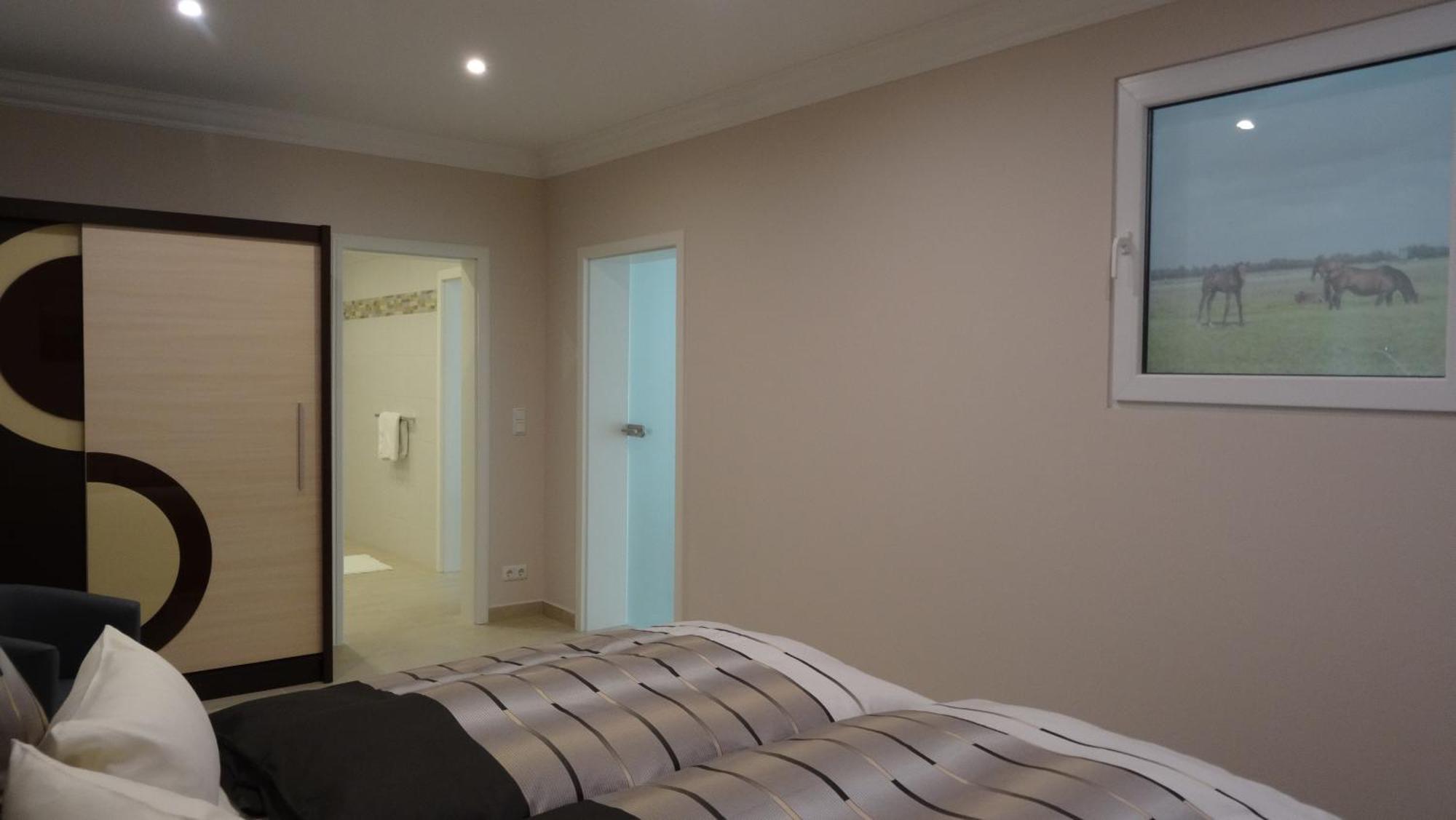Gaestezimmer & Appartement Elskop Pokoj fotografie